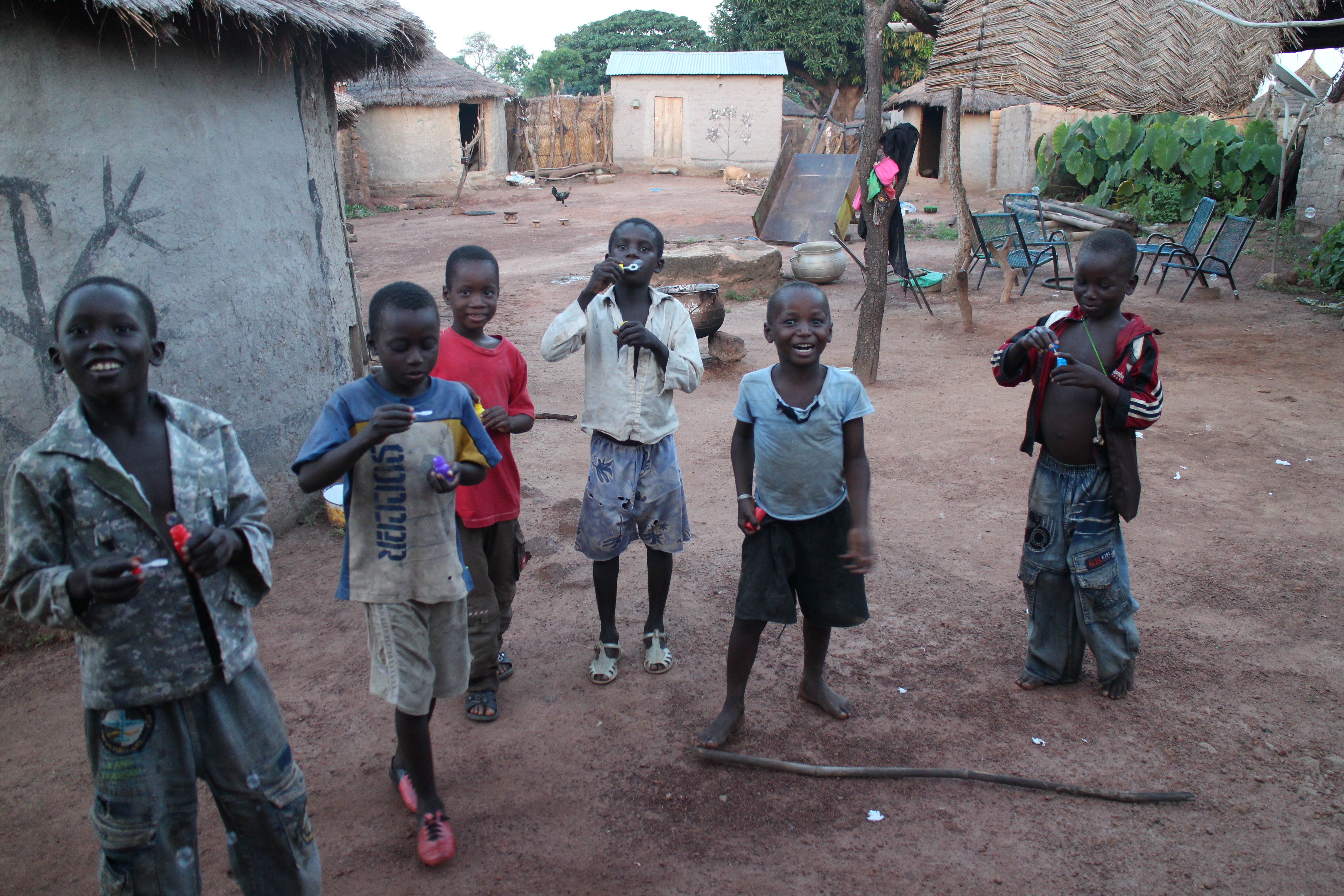 Group of children blowing bubbles